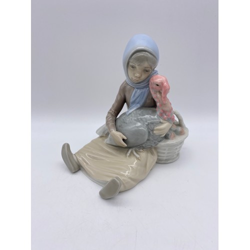 225 - NAO AND LLADRO FIGURES GIRL WITH A TURKEY AND GIRL WITH A DOVE