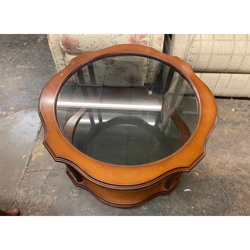 38 - MAHOGANY SERPENTINE GLASS INSET COFFEE TABLE WITH UNDER TIER