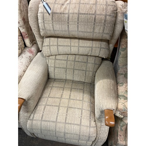 55 - CREAM AND CHEQUER PATTERN FABRIC RISER ARMCHAIR