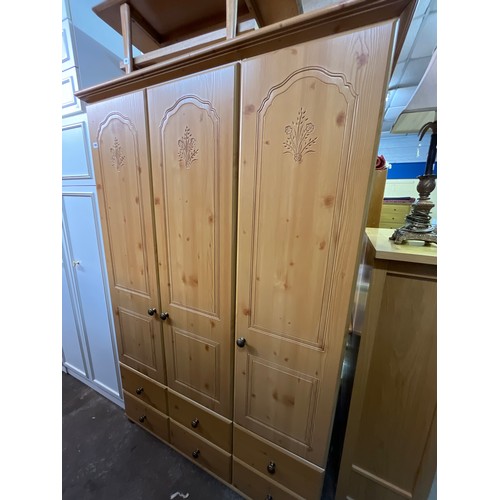 100 - PINE EFFECT TRIPLE WARDROBE WITH DRAWER BASE