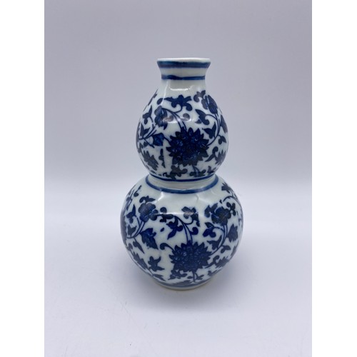 301 - SHELF OF CHINESE BLUE AND WHITE VASES INCLUDING BOTTLE AND DOUBLE GOURD EXAMPLES