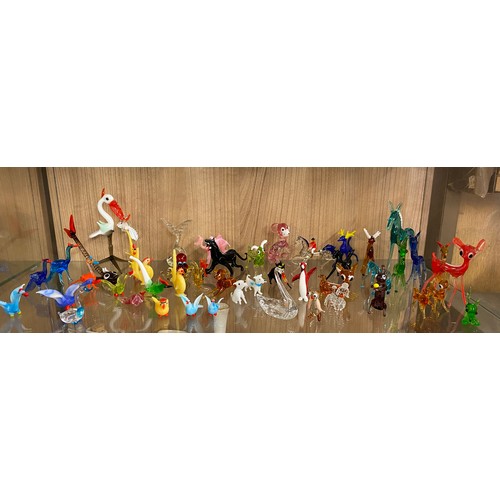 309 - SHELF OF MURANO COLOURED GLASS MINIATURE ANIMAL FIGIURES