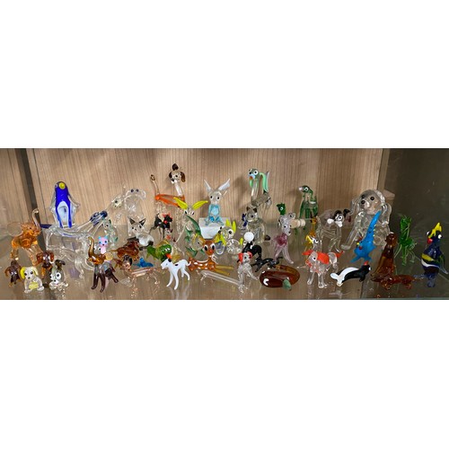 312 - SHELF OF MINIATURE MURANO AND OTHER COLOURED GLASS ANIMALS