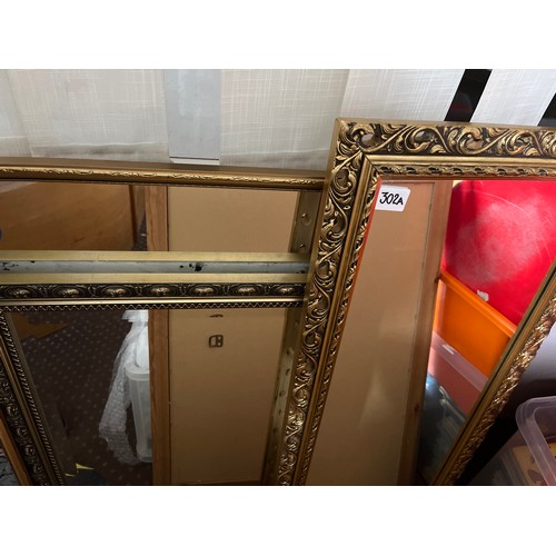 302A - GILT ACANTHUS FRAMED OBLONG MIRROR AND TWO OTHER GILT MIRRORS