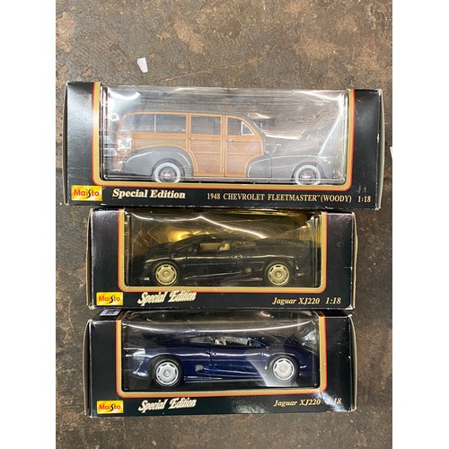 292 - 3 MAISTO 1/18 SCALE SPECIAL EDITIONS WITH METALLIC BLUE JAGUAR XJ220, BLUE JAGUAR XJ220 AND A 1948 C... 