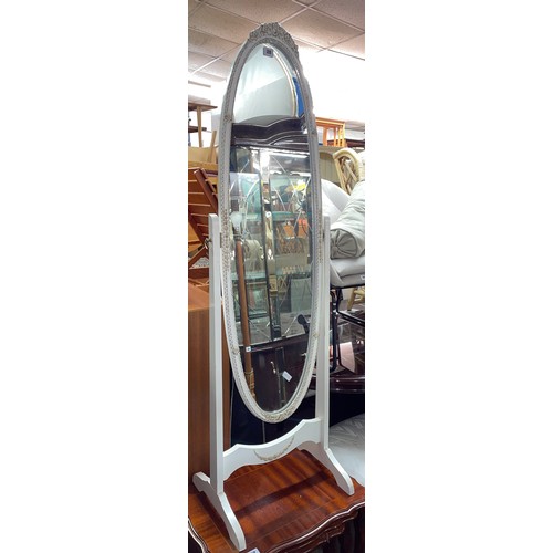 28 - WHITE PAINTED AND GILT OVAL CHEVAL MIRROR