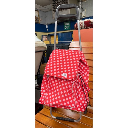 66 - LIGHT WEIGHT NYLON RED POLKA DOT TROLLEY BAG