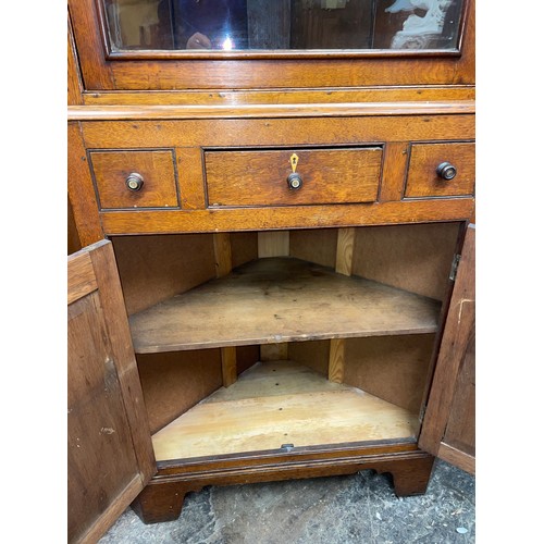 70 - 19TH CENTURY OAK FULL HEIGHT GLAZED DOOR CORNER CABINET