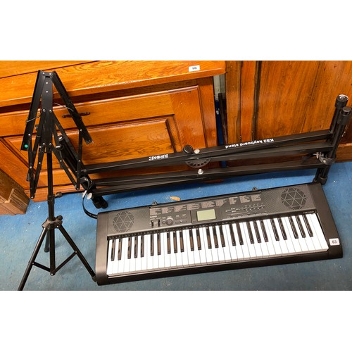 63 - KS2 KEYBOARD AND STAND, AND A MANUSCRIPT STAND