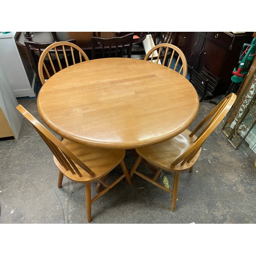 111 - CIRCULAR PEDESTAL BREAKFAST TABLE AND FOUR HOOP BACK CHAIRS