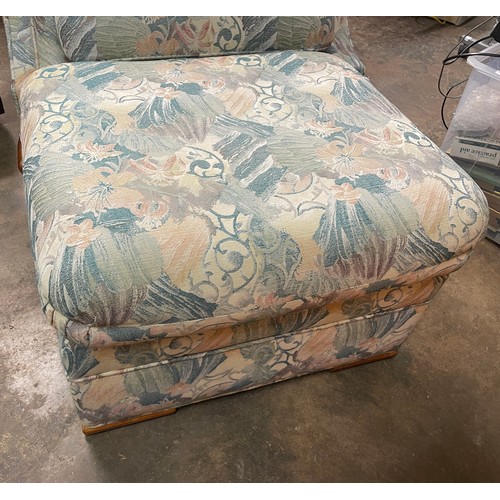 106 - FLORAL FABRIC WING ARMCHAIR ON CABRIOLE LEGS AND MATCHING FOOTSTOOL