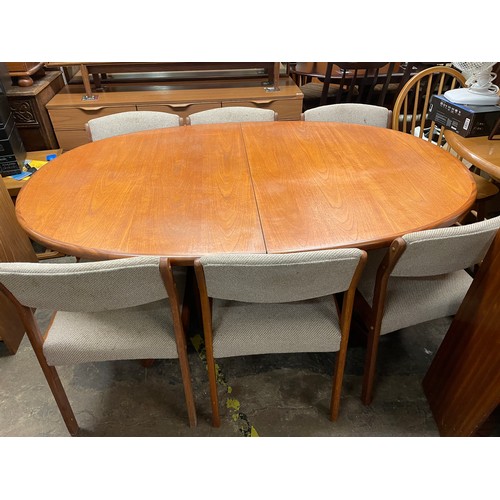 107 - TEAK G PLAN OVAL DINING TABLE AND CHAIRS