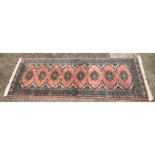 35 - PINK GROUND CARPET RUNNER