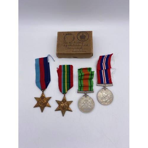 512 - WWII MEDAL GROUP DEFENCE MEDAL, SERVICE MEDAL, PACIFIC STAR, AND 1939-45 STAR IN ORIGINAL BOX OF ISS... 