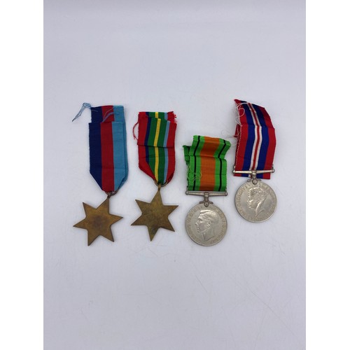 512 - WWII MEDAL GROUP DEFENCE MEDAL, SERVICE MEDAL, PACIFIC STAR, AND 1939-45 STAR IN ORIGINAL BOX OF ISS... 