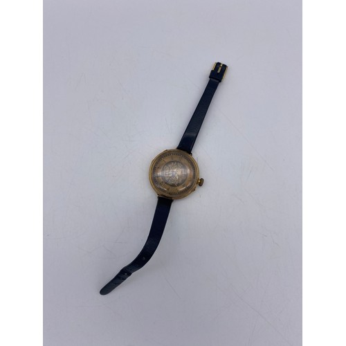 506 - 18CT GOLD ENGRAVED CASED WRIST WATCH ON FINE LEATHER STRAP 36.G OVERALL APPROX