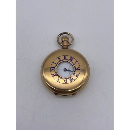 515 - GOLD PLATED CASED HALF HUNTER POCKET WATCH WITH WHITE ENAMEL DIAL AND ROMAN NUMERALS THE FRONT CASE ... 