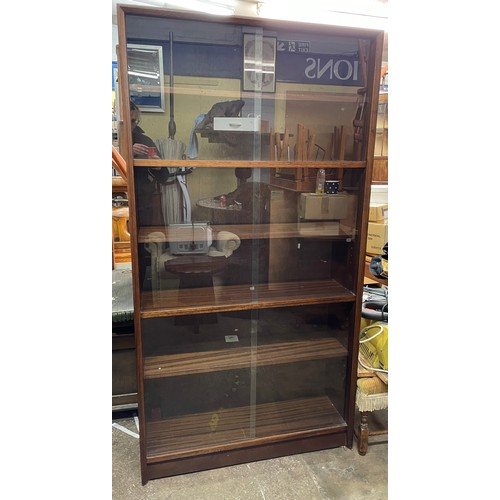 23 - 1960S GIBBS TEAK DOUBLE HEIGHT GLAZED DOOR BOOKCASE CABINET