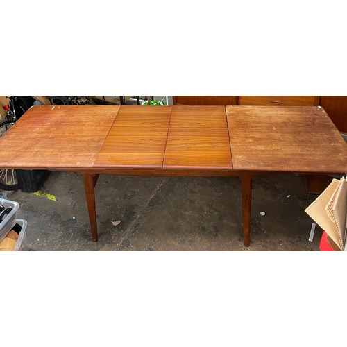 160 - 1960/70S DANISH MOGENS KOLD TEAK EXTENDING DINING TABLE AND THREE CHAIRS (250CM FULLY EXTENDED)