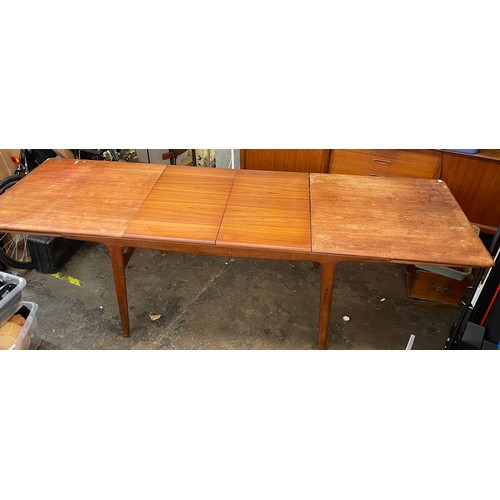 160 - 1960/70S DANISH MOGENS KOLD TEAK EXTENDING DINING TABLE AND THREE CHAIRS (250CM FULLY EXTENDED)