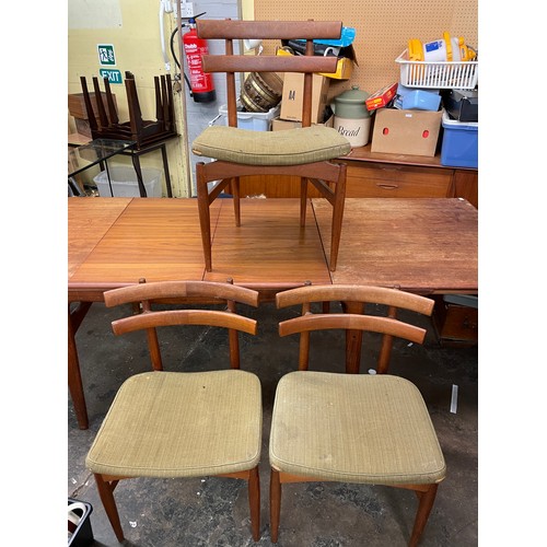 160 - 1960/70S DANISH MOGENS KOLD TEAK EXTENDING DINING TABLE AND THREE CHAIRS (250CM FULLY EXTENDED)