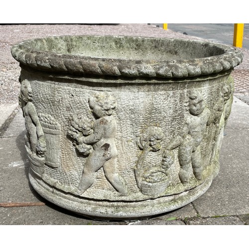 223 - LARGE CIRCULAR CHERUB STONE PLANT POT