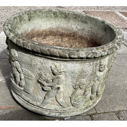 223 - LARGE CIRCULAR CHERUB STONE PLANT POT