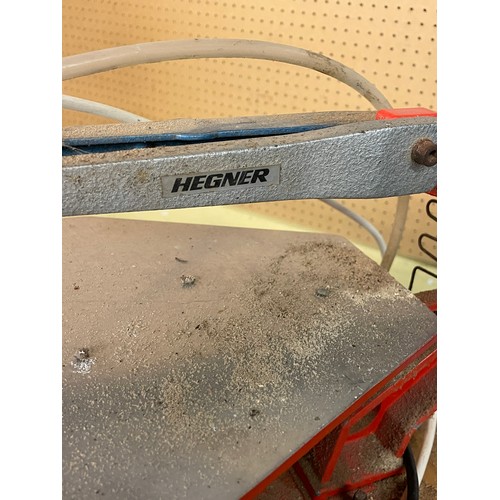 246 - RED HEGNER FRET BLADE SAW SELECTION MOUNTED ON GREEN METAL CABINET