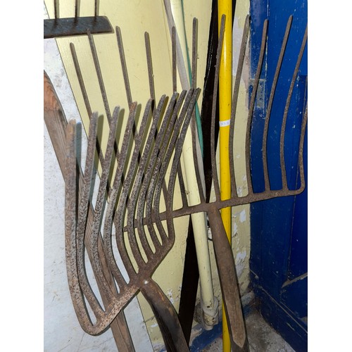 217 - TWO VINTAGE HAY FORKS, HOE, ETC