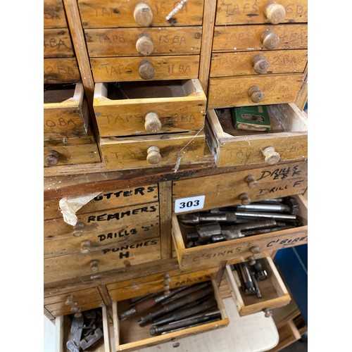 303 - THREE WOODEN MULTI DRAWER CHESTS OF ENGINEERING RELATED TOOL, DRILLS, PUNCHES, TAPS