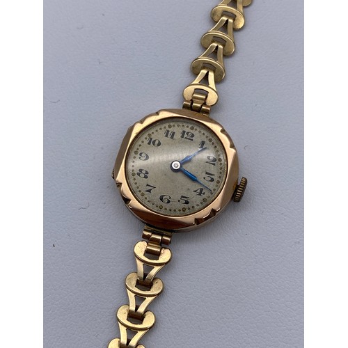 546 - 9CT ROSE GOLD STEPPED OCTAGONAL CASED LADIES WRIST WATCH ON A ROLLED GOLD STRAP 12.7G OVERALL