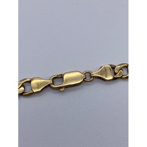 560 - 9CT GOLD FLAT CURB LINK CHAIN WITH LOBSTER CLAW FASTENER 32G APPROX