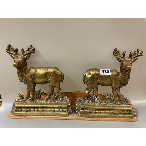 430 - PAIR OF BRASS STAG DOOR STOPS MOUNTED ON A PLINTH