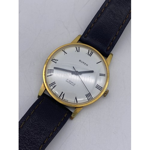 564 - GENTLEMANS CASED BUREN 17 JEWEL WRIST WATCH ON LEATHER STRAP