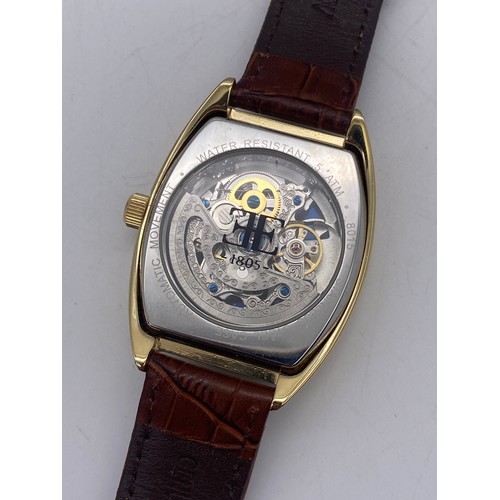 571 - GENTLEMAN'S EARNSHAW TONNEAU CASED SKELETON BACK AUTOMATIC WRISTWATCH ON LEATHER STRAP AND A SIMILAR... 