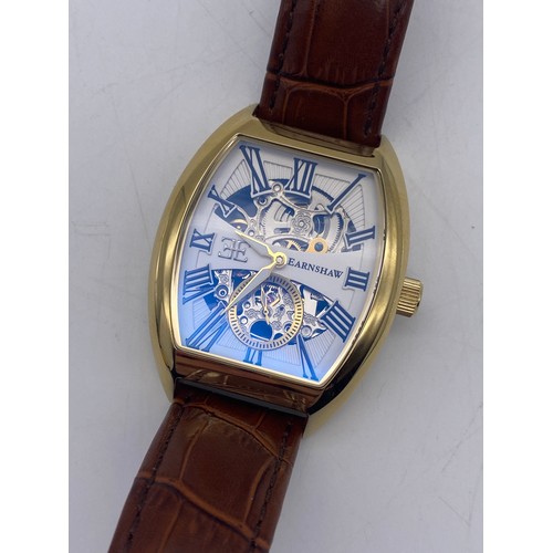 571 - GENTLEMAN'S EARNSHAW TONNEAU CASED SKELETON BACK AUTOMATIC WRISTWATCH ON LEATHER STRAP AND A SIMILAR... 