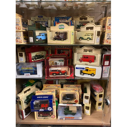 422 - SIX SHELVES OF BOXED MATCHBOX, LLEDO AND OTHER DIECAST MODEL CARS AND FARM VEHICLE TOYS