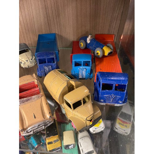 426 - TWO SHELVES OF PLAYWORN DINKY AND CORGI TOY CARS, FARM VEHICLES, AND TRUCKS