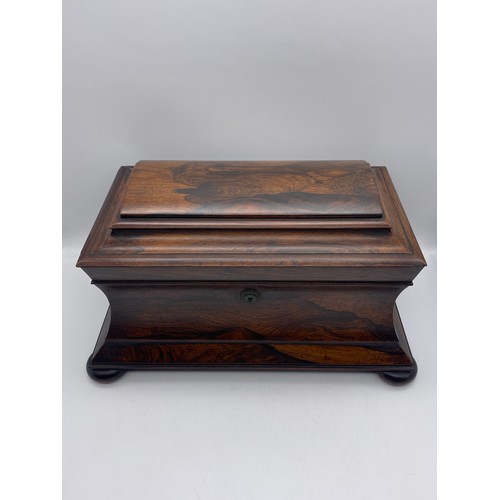 610 - REGENCY ROSE WOOD SARCOPHAGUS SHAPED TEA CADDY BOX WITH RING TURNED CARRY HANDLES AND BUN FEET, THE ... 