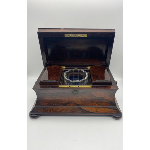 610 - REGENCY ROSE WOOD SARCOPHAGUS SHAPED TEA CADDY BOX WITH RING TURNED CARRY HANDLES AND BUN FEET, THE ... 