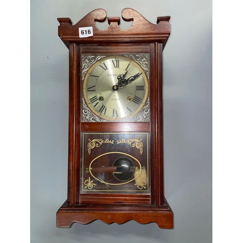 616 - MODERN CASED 31 DAY WALL CLOCK