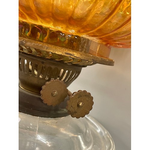 488 - LATE VICTORIAN OIL LAMP WITH CLEAR GLASS RESERVOIR AND MOULDED AMBER CRIMPED SHADE