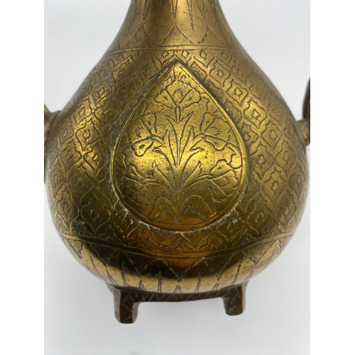 700 - 19TH CENTURY EASTERN BRASS ENGRAVED EWER