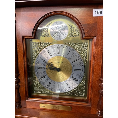 100A - REPRODUCTION HOWARD MILLER BRASS FACED LONG CASE CLOCK WITH WEIGHTS AND PENDULUM