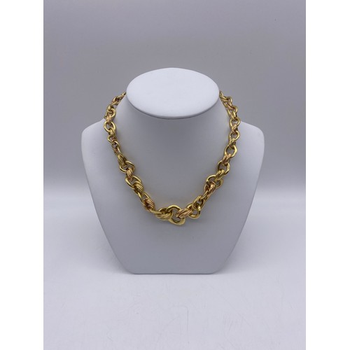 578 - 18CT GOLD TWIST LINK HOLLOW CHAIN 46.2G APPROX