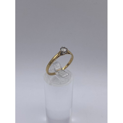 588 - STAMPED 18CT GOLD SOLITAIRE RING WITH CZ STONE SIZE N/O 2.3G APPROX