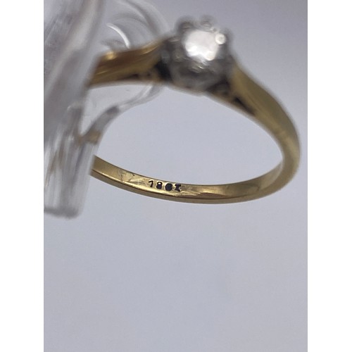 588 - STAMPED 18CT GOLD SOLITAIRE RING WITH CZ STONE SIZE N/O 2.3G APPROX