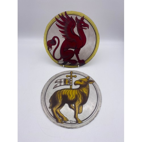 646 - TWO STAINED GLASS ROUNDELS OF A GRIFFIN AND A LAMB