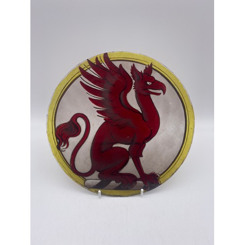 646 - TWO STAINED GLASS ROUNDELS OF A GRIFFIN AND A LAMB