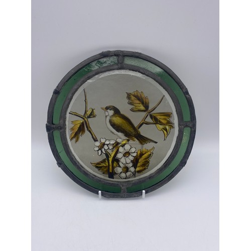 647 - TWO POSSIBLY 19TH CENTURY STAINED GLASS ROUNDELS OF BIRDS